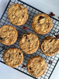 Oats & Cranberry cookies with raisins on a cooling rack